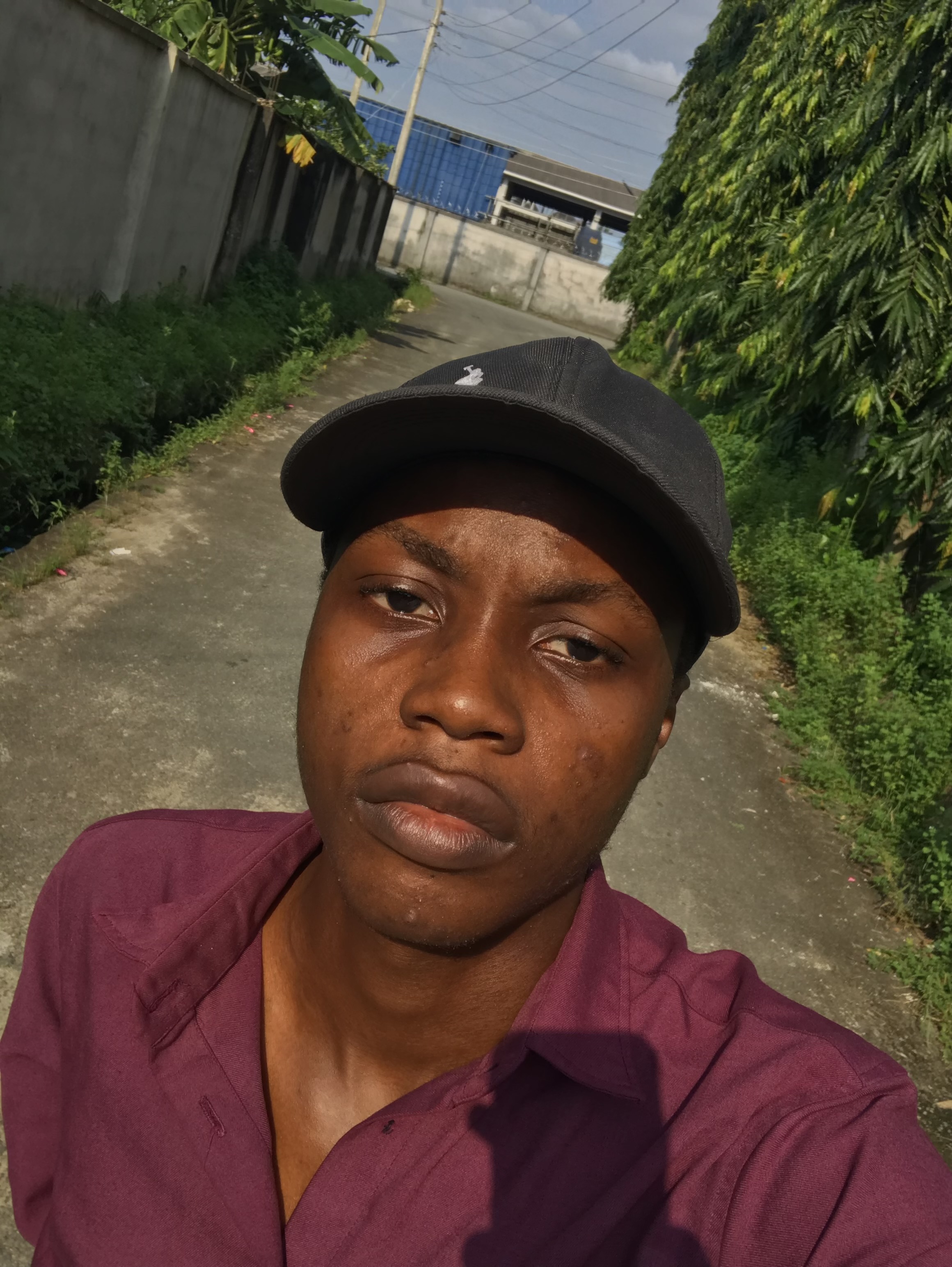 Portrait of Kennedy Azeru — Backend and AI Engineer, B.Tech Cybersecurity